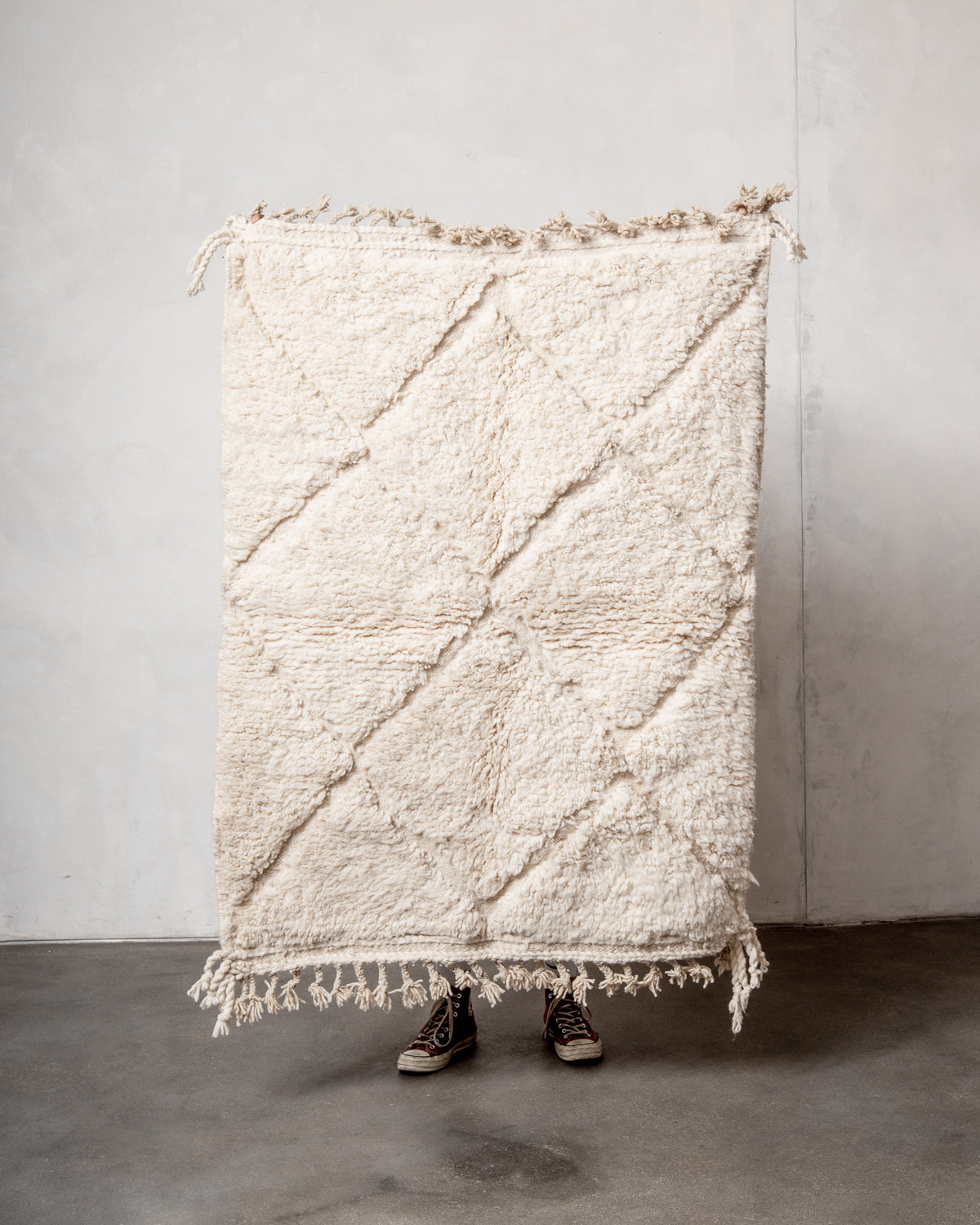Modern, designer, handcrafted Berber rug from Morocco. Beniourain carpet with minimalist design, natural wool pile and a fluffy texture.